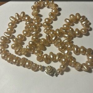 Approx 26” of gorgeous faux baroque pearls with beautiful clasp